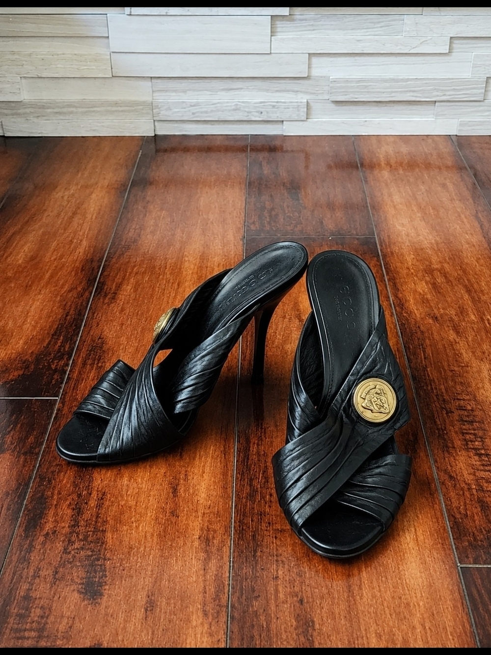 Gucci Black Leather High Heel Slide with Gold Medallion